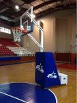 Height adjustable basketball hoop